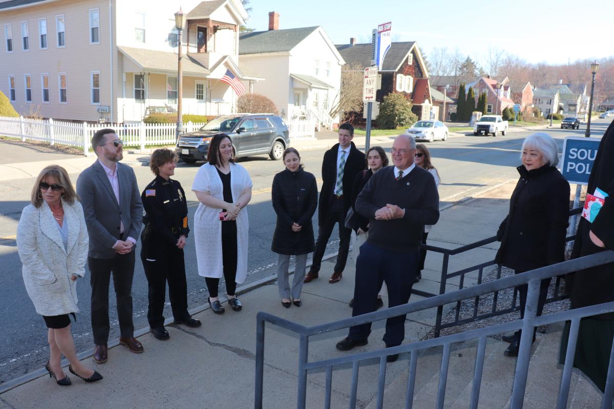 South Hadley residents, elected officials and others gather at the police station Monday.