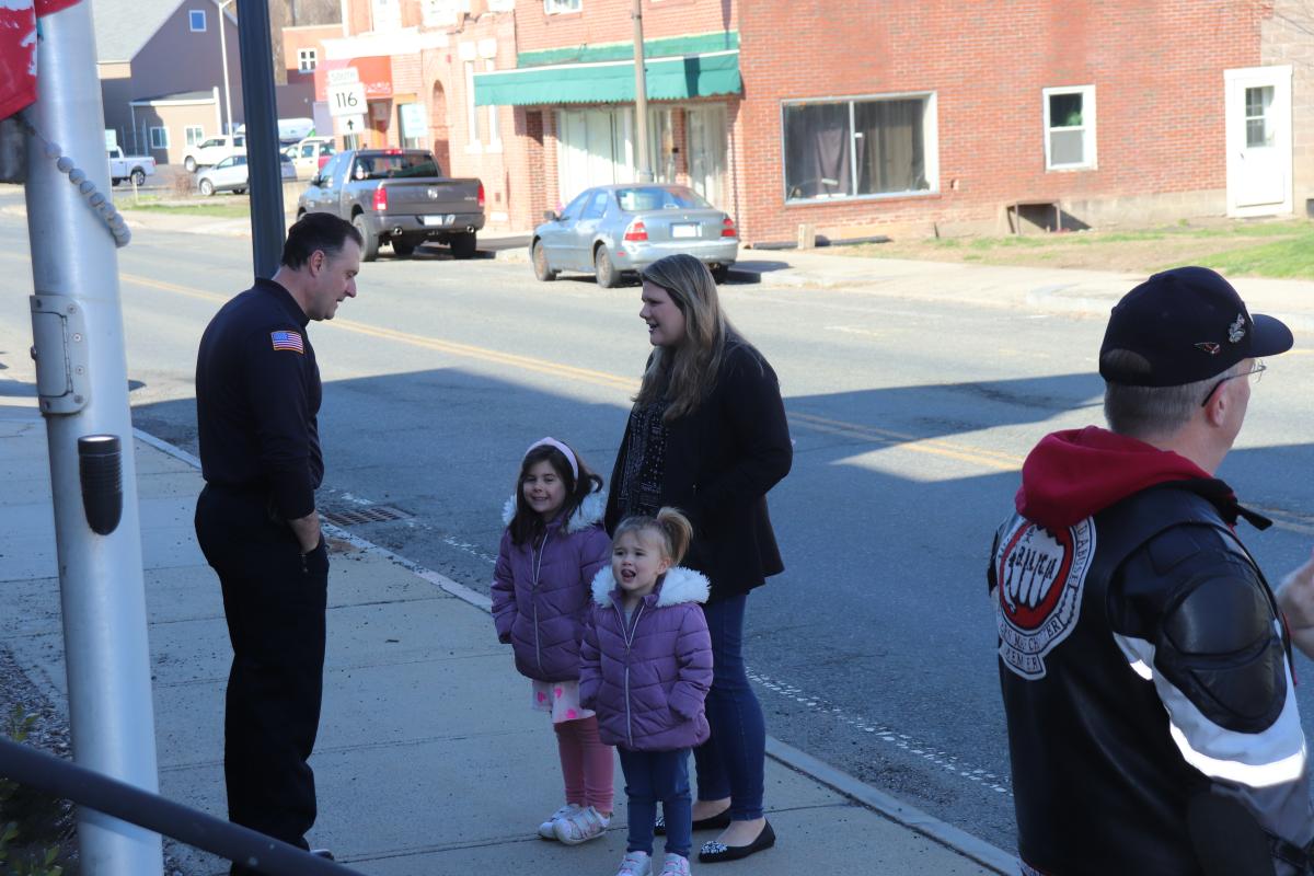 Scenes from the flag-raising in South Hadley Monday.