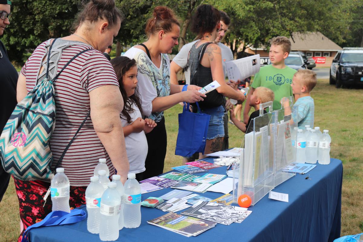 Residents of Orange turn out for a National Night Out event in Butterfield park.