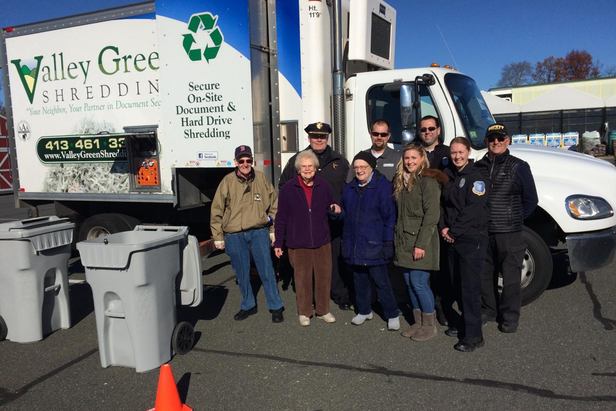 photo of Rachel Senecal and TRIAD members at Hadley/Amherst Shredding Event