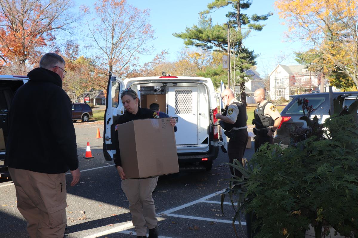 Crews at Saturday's drug take back event unload from surrounding Hampshire and Franklin County communities.