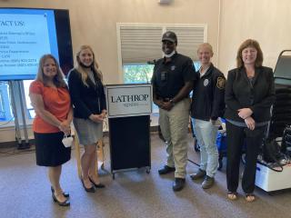Northwestern District Attorney's staff at an educational presentation at the Lathrop Community.